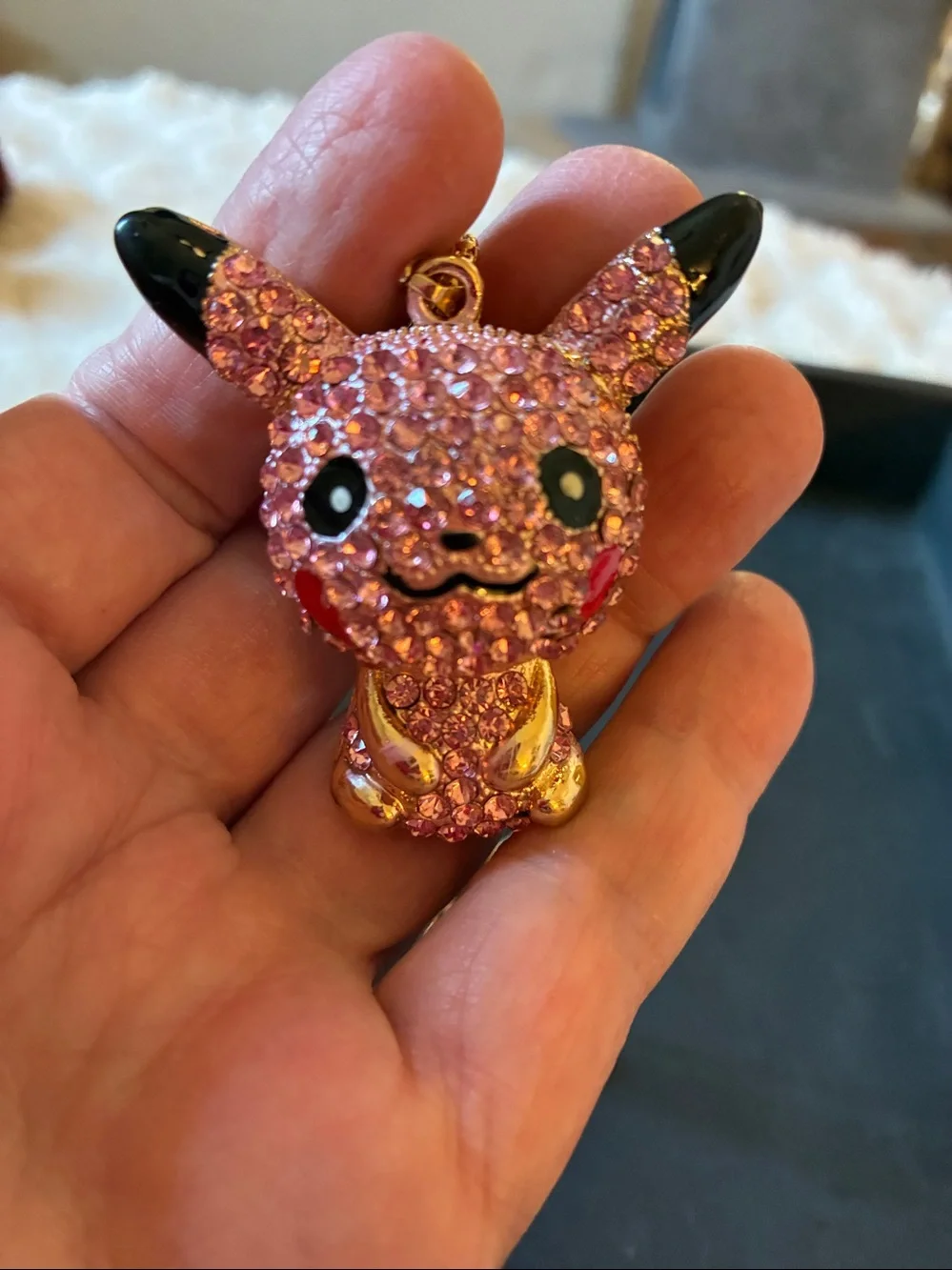 Pikachu Pink Crystal Pendant comes on a golden necklace. NWOT